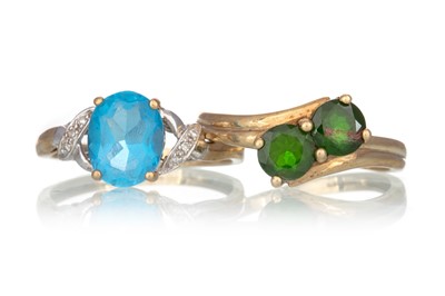 Lot 475 - TOPAZ AND DIAMOND RING AND A GREEN GARNET TWO STONE RING