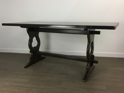 Lot 276 - ERCOL DARK OAK DINING TABLE