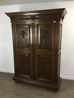 Lot 295 - CARVED OAK WARDROBE