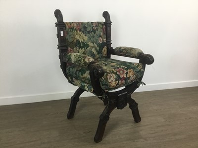 Lot 303 - OAK X-FRAME ARMCHAIR