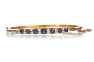 Lot 530 - SAPPHIRE AND DIAMOND BANGLE