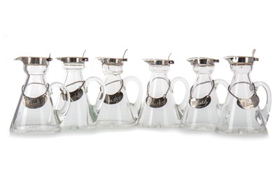 Lot 1383 - MATCHED SET OF SIX OF SILVER MOUNTED CLEAR GLASS WHISKY NOGGINS