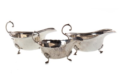 Lot 1390 - THREE SILVER SAUCE BOATS