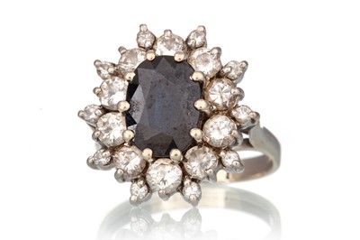 Lot 605 - SAPPHIRE AND DIAMOND CLUSTER RING