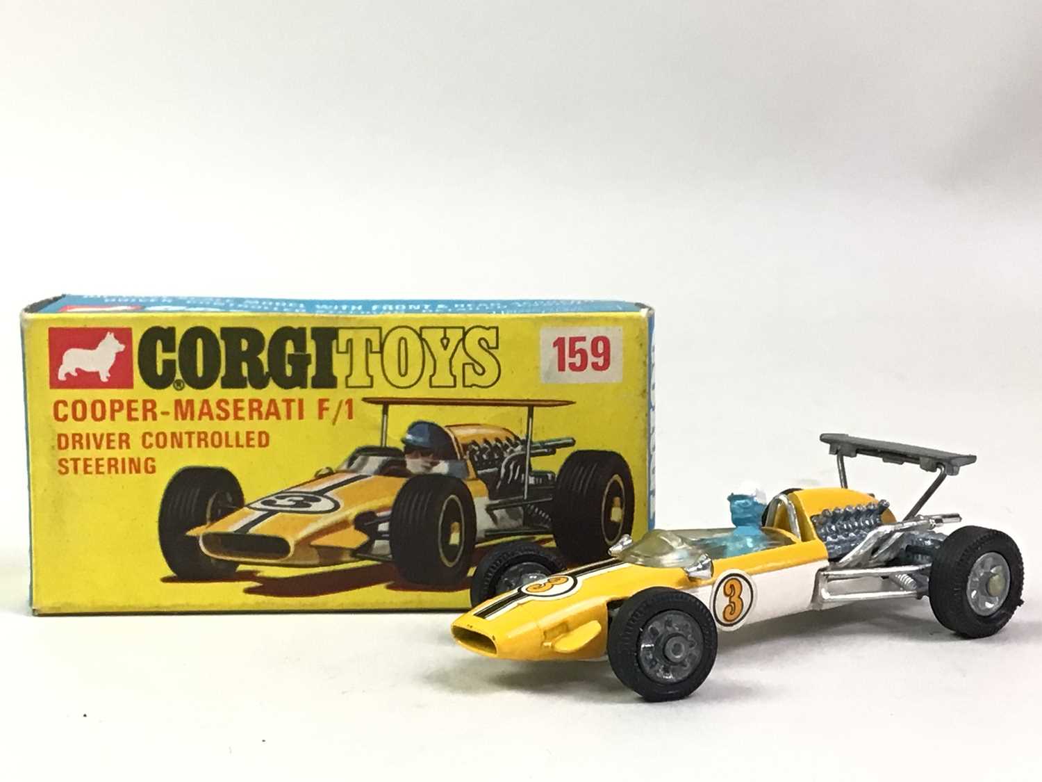 A Corgi Toys Cooper-Maserati F1 die-cast model racing car with driver controlled steering, detailed