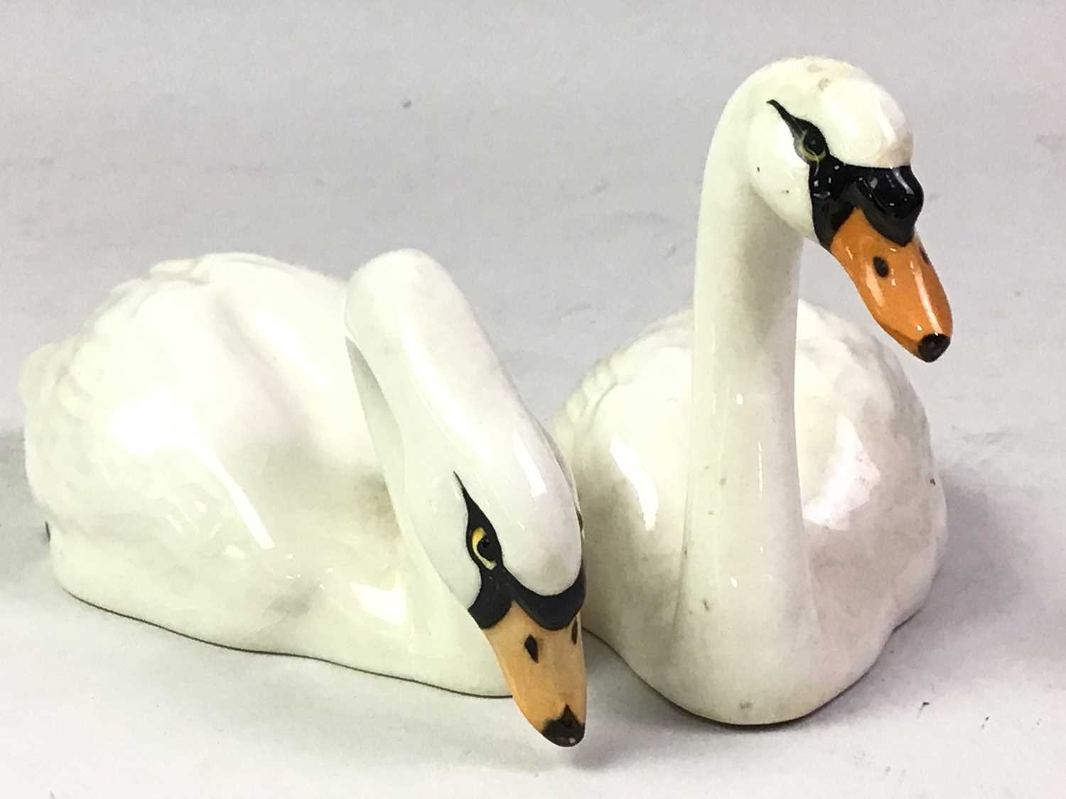 Lot 54 - TWO BESWICK SWANS WITH CYGNETS,