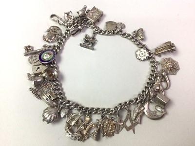 Lot 202 - SILVER CHARM BRACELET