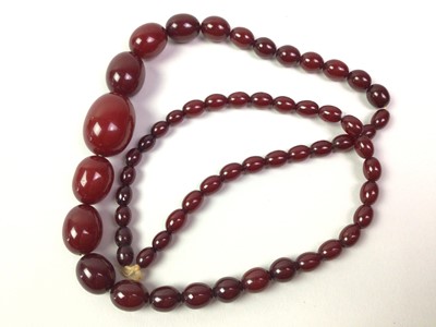 Lot 529 - TWO CHERRY BAKELITE NECKLACES