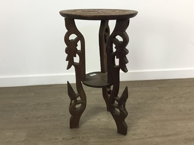 Lot 555 - CARVED TRIPOD TABLE