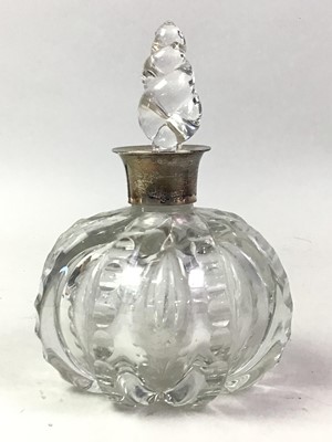 Lot 669 - GEORGE V SILVER MOUNTED GLASS PERFUME BOTTLE