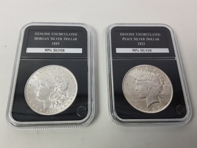 Lot 46 - TWO US SILVER DOLLARS