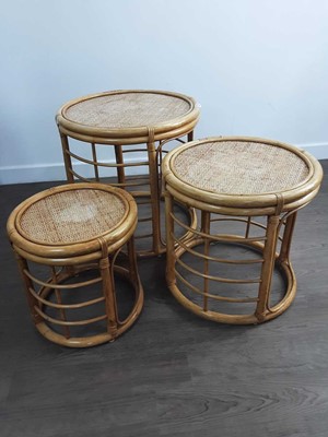 Lot 120 - CANE NEST OF THREE TABLES