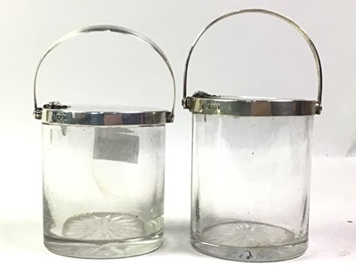 Lot 331 - TWO SILVER TOPPED GLASS JARS