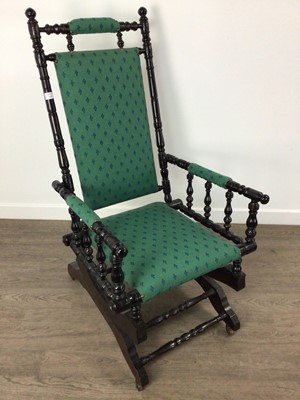Lot 259 - AMERICAN SPRING ROCKING ARMCHAIR