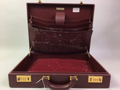 Lot 544 - BURGUNDY BRIEFCASE, WITH CARTIER EMBLEM