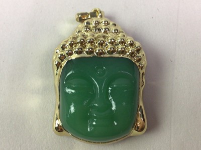 Lot 651 - PENDANT IN FORM OF A BUDDHA HEAD
