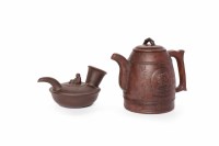 Lot 299 - TWO 20TH CENTURY CHINESE YIXING TEA POTS one...