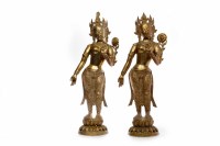 Lot 365 - TWO LARGE 20TH CENTURY BRASS STATUES OF TARA...