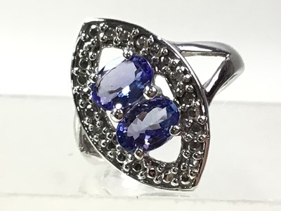 Lot 660 - TANZANITE AND DIAMOND RING