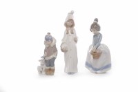 Lot 428 - GROUP OF THREE LLADRO FIGURES modelled as...