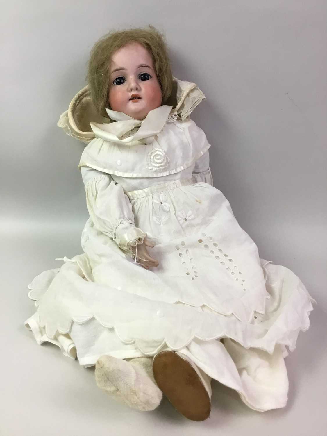 Lot 861 - THREE BISK HEADED DOLLS