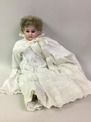 Lot 861 - THREE BISK HEADED DOLLS