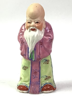 Lot 17 - CHINESE PORCELAIN FIGURE