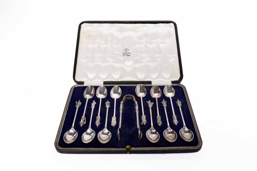 Lot 1 - SET OF TWELVE SILVER APOSTLE SPOONS AND TONGS...