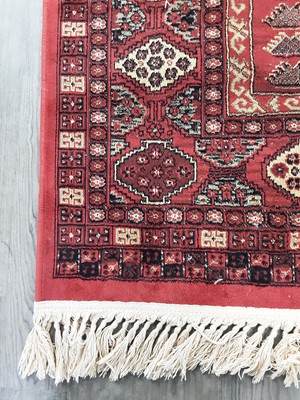 Lot 496 - THREE EASTERN STYLE WOOL RUGS