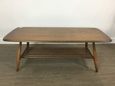 Lot 560 - ERCOL NEST OF THREE TABLES