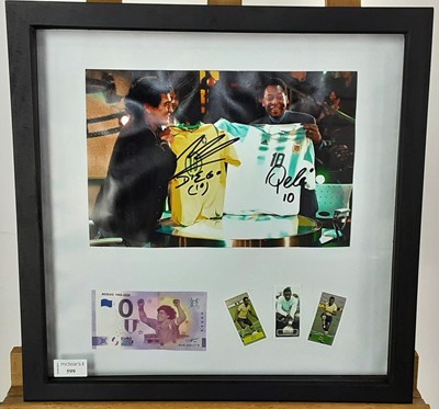 Lot 599 - DIEGO MARADONA AND PELE SIGNED DISPLAY