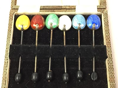 Lot 637 - SIX SILVER AND ENAMEL COFFEE SPOONS