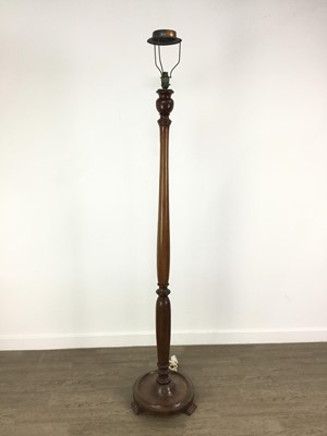 Lot 631 - TWO MAHOGANY STANDARD LAMPS