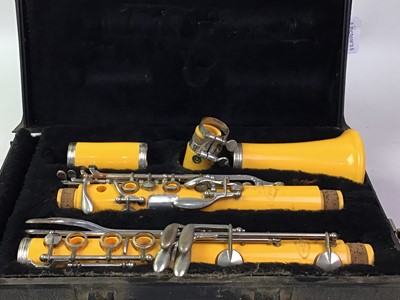 Lot 642 - AMBER COLOURED CLARINET