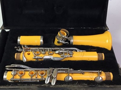 Lot 642 - AMBER COLOURED CLARINET