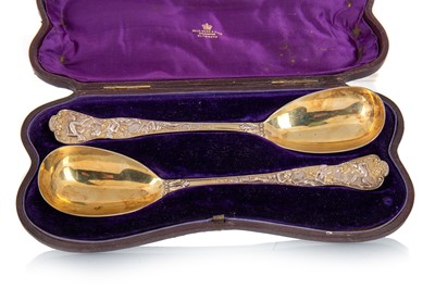 Lot 1003 - CASED PAIR OF VICTORIAN SILVER GILT SERVING SPOONS