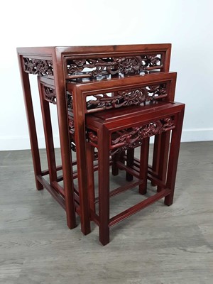 Lot 148 - CHINESE HARDWOOD NEST OF FOUR TABLES