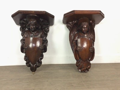 Lot 1308 - MATCHED PAIR OF CARVED WALNUT WALL BRACKETS