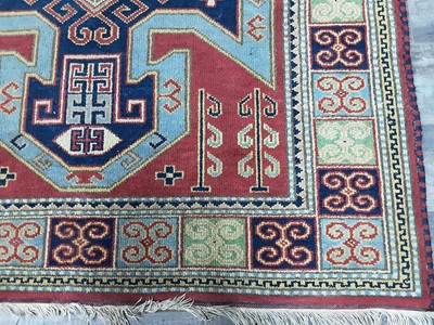 Lot 409 - KAZAK RUG