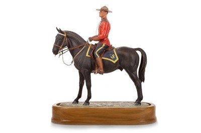 Lot 1347 - DORIS LINDNER FOR ROYAL WORCESTER, ROYAL CANADIAN MOUNTED POLICEMAN