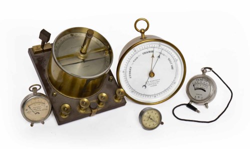 Lot 631 - BRASS CASED ANEROID BAROMETER signed on the...