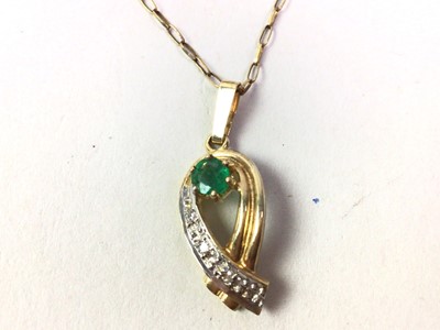 Lot 374 - NINE CARAT GOLD EMERALD AND DIAMOND PENDANT