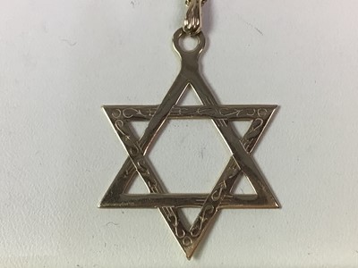 Lot 375 - NINE CARAT GOLD STAR OF DAVID PENDANT