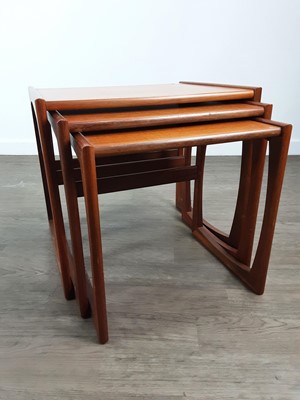 Lot 647 - G-PLAN TEAK QUADRILLE NEST OF THREE TABLES