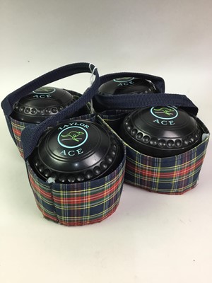 Lot 737 - SET OF FOUR TAYLORS LAWN BOWLS