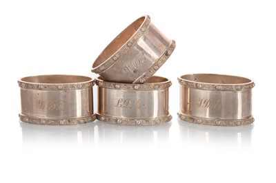 Lot 1022 - SET OF FOUR SILVER NAPKIN RINGS