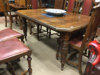 Lot 888 - VICTORIAN OAK EXTENDING DINING TABLE the top...