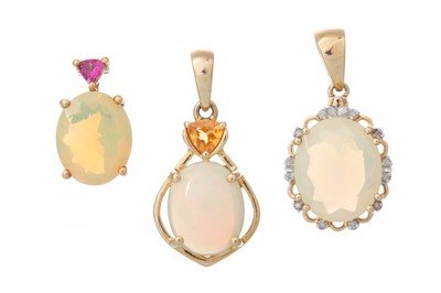 Lot 622 - THREE ETHIOPIAN OPAL PENDANTS