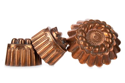 Lot 1255 - THREE COPPER JELLY MOULDS