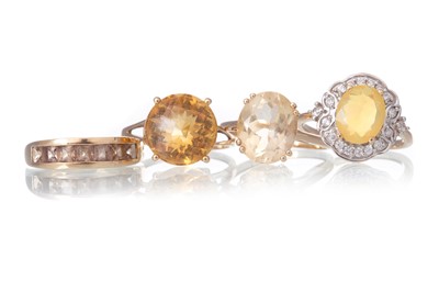 Lot 638 - FOUR GEM SET RINGS